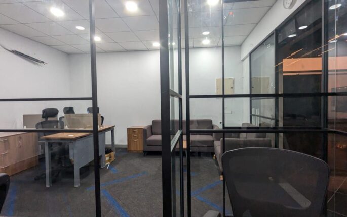 Sensor-operated automatic sliding glass door installed in Chennai commercial space
